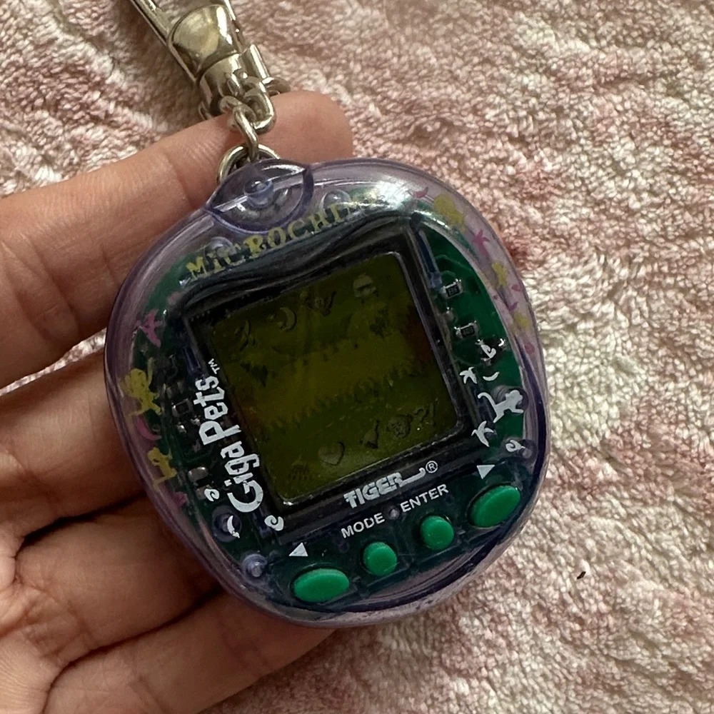 1997 Microchimp Purple Giga Pets Digital Keychain
